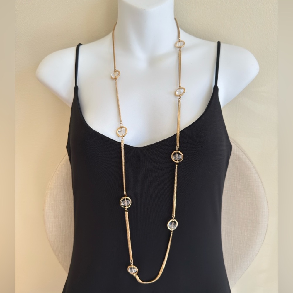 Chico’s Slinky Single Strand Gold and clear bead necklace